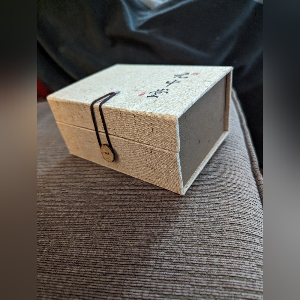 3/$30.  Fabric covered Button and magnetic  closure, velvet  lined box.